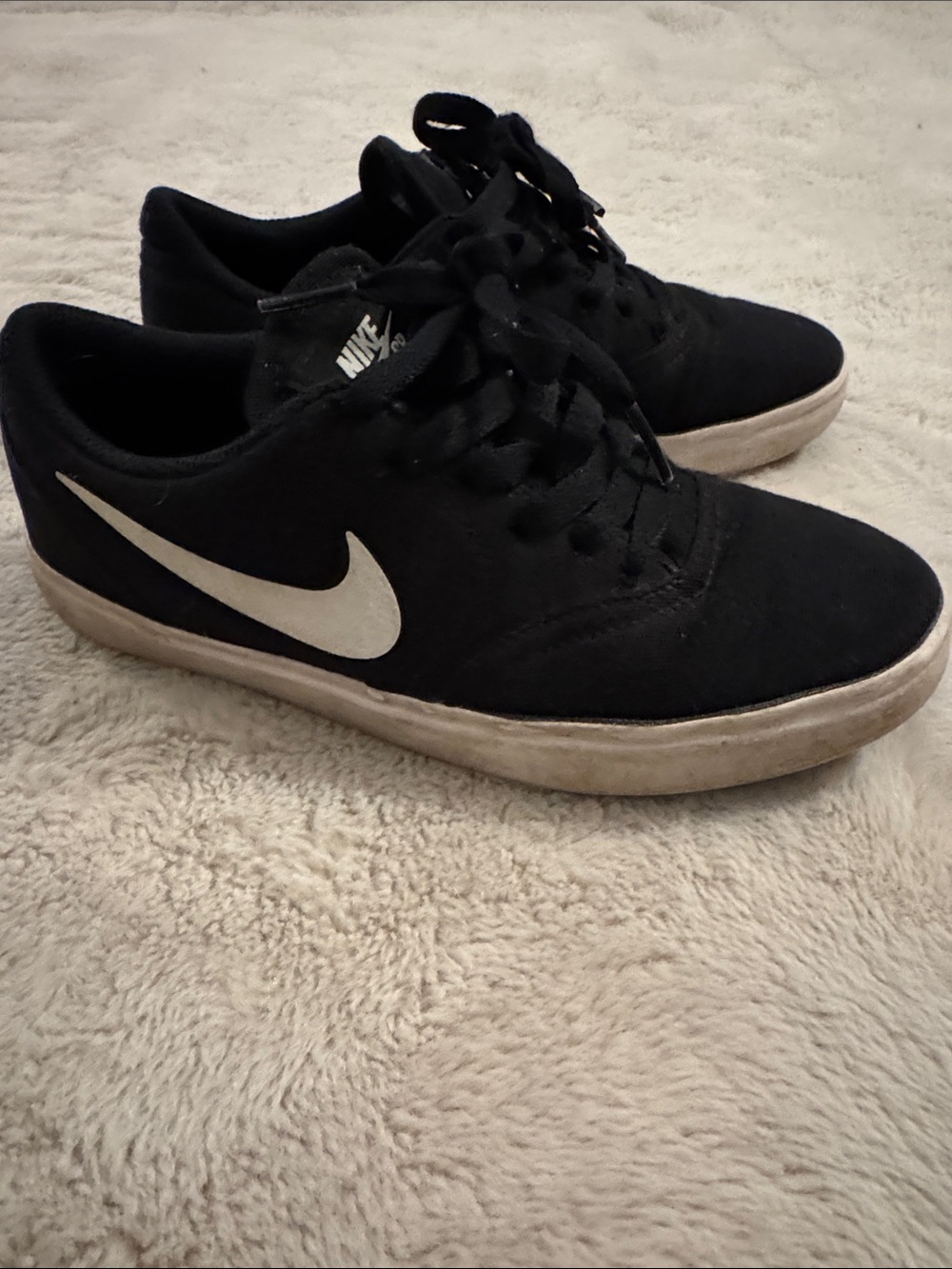 Nike Kids Black Sneakers with White Swoosh